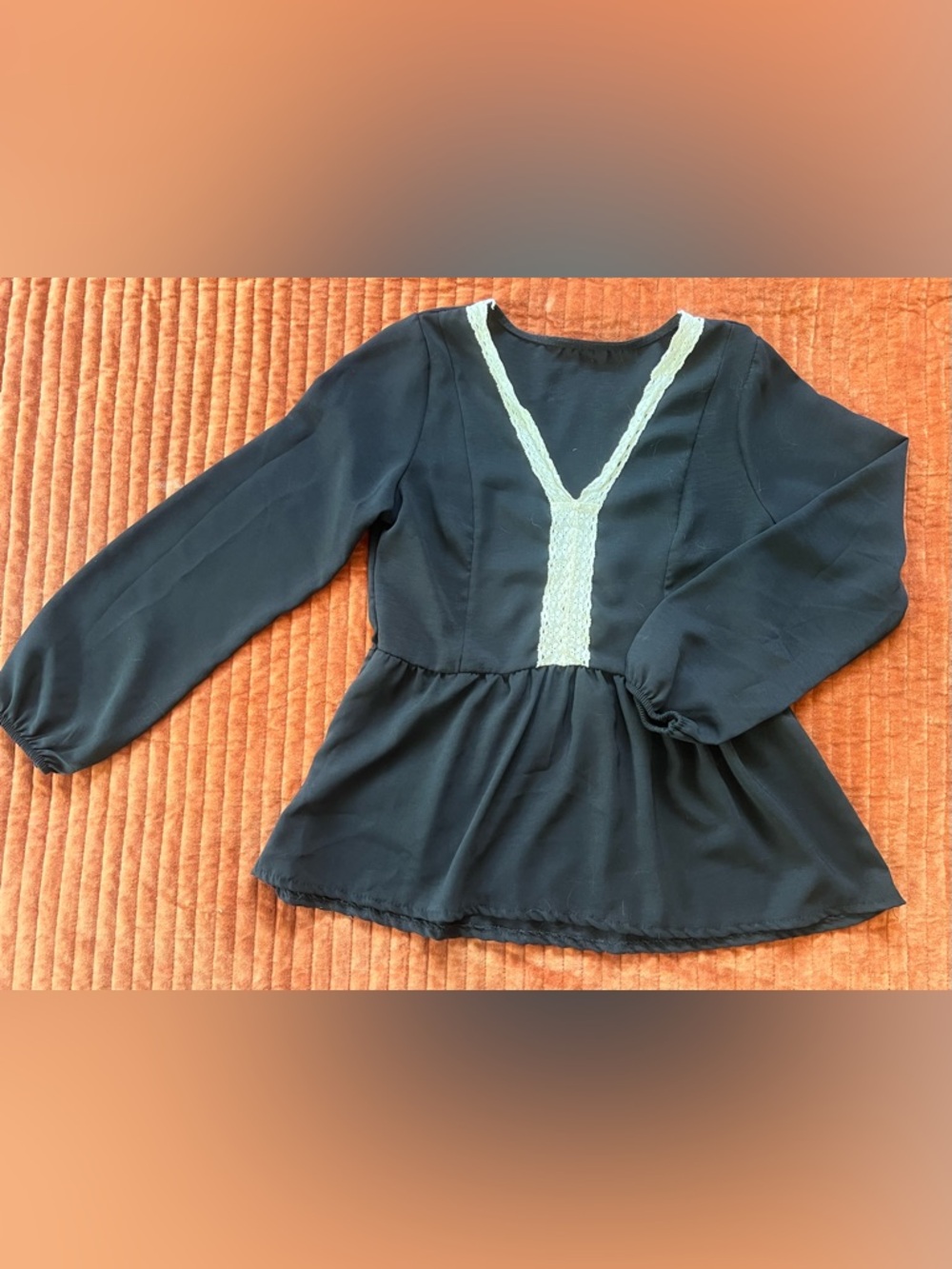 Black Long-Sleeve Peplum Blouse with Cream Lace Trim